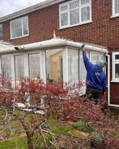 Wiping down conservatory